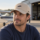 Pilot wearing Wright Brothers 1903 cap